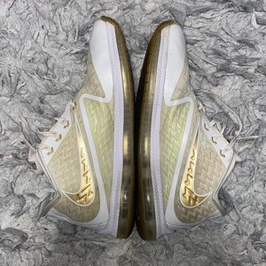 Gold & white Nike running shoes